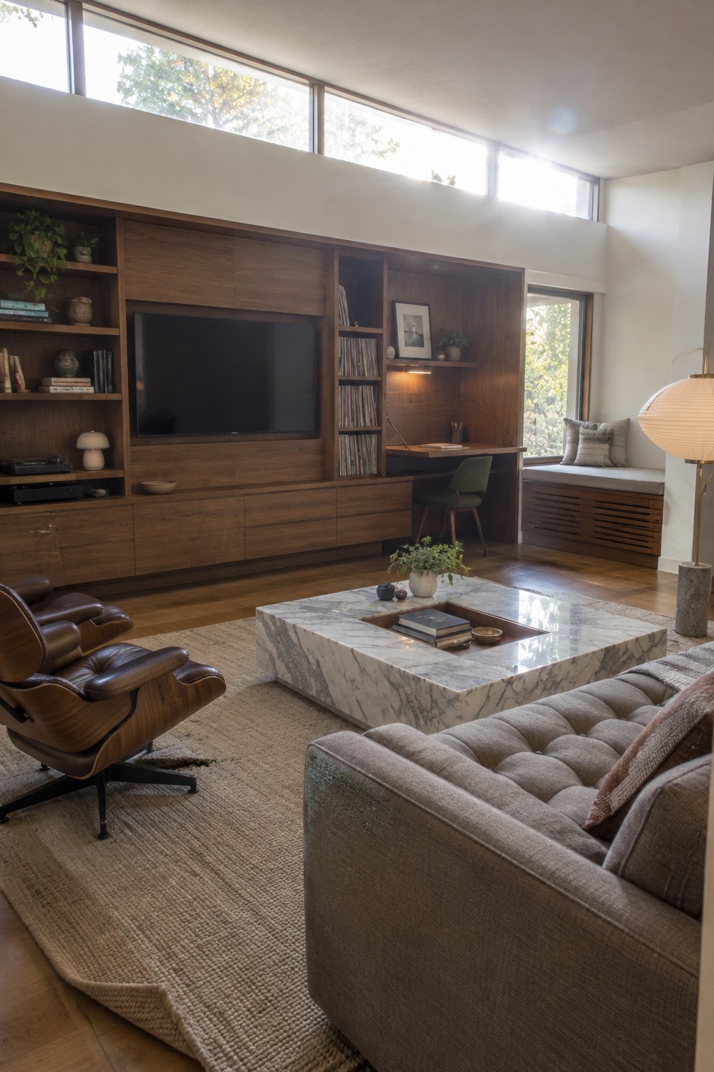A mid-century modern living room with a wood built-in wall, closed cabinets, open shelves, and a television.